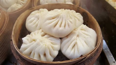   Yangquan Steamed Bun: En Lätt & Smörjig Delicatel för Dina Sinnen!